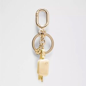 Lululemon Everywhere Belt Bag Charm Keychain- Butter Cream/Gold